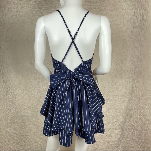 🔥Lulus Ruffle & Flow Black Striped Backless Ruffle
Romper Blue White - Picture 8 of 16